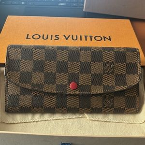 Brand new with tags. Authentic- LV Emilie Wallet in supple Damier Ebene